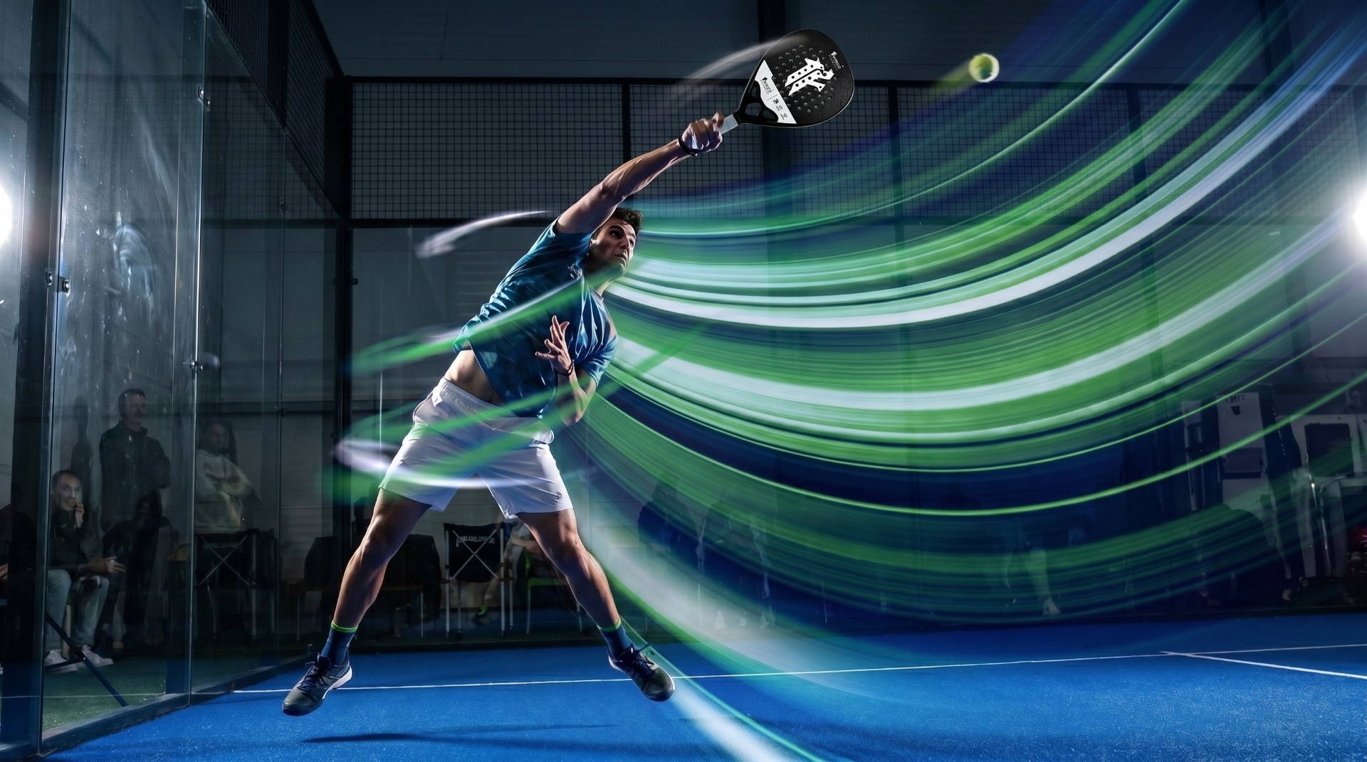 Fierce paddle held mid-swing on court